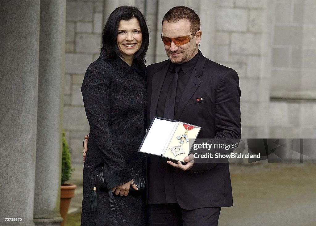 Bono, birth name Paul Hewson, poses with his wife Ali Hewson after