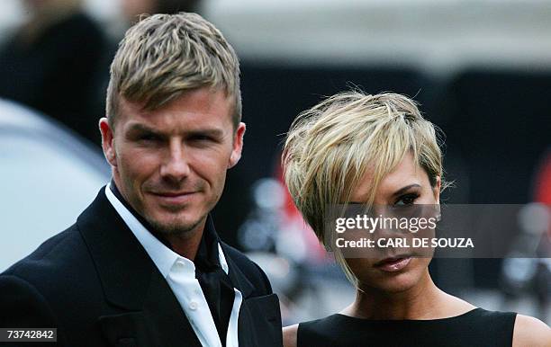 London, UNITED KINGDOM: British football player David Beckham and his wife Victoria arrive for the Sports Industry awards in London, 29 March 2007....