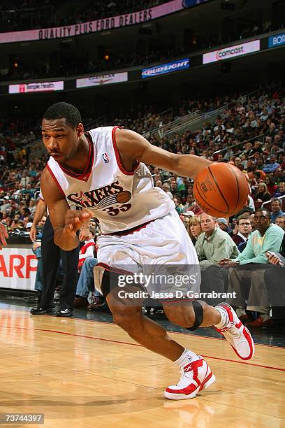 Willie Green of the Philadelphia 76ers moves the ball against the Houston Rockets during the game at Wachovia Center on March 18, 2007 in...