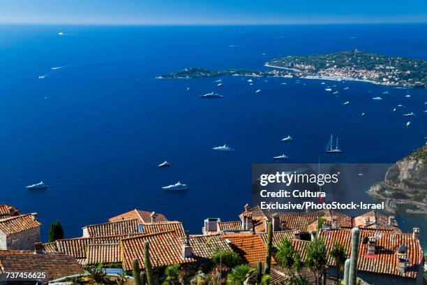 view of saint-jean-cap-ferrat, viewed from eze, antibes, provence-alpes-cote dazur, france - antibes stock pictures, royalty-free photos & images