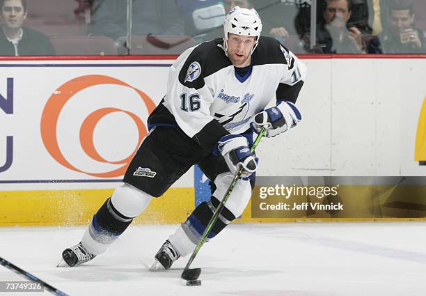 Jason Ward of the Tampa Bay Lightning skates with the puck against the Vancouver Canucks during their NHL game on March 6, 2007 at General Motors...