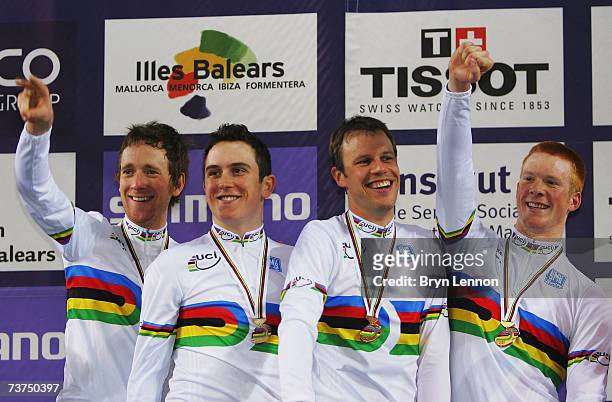 Bradley Wiggins, Geraint Thomas, Paul Manning and Ed Clancy of Great Britain celebrate victory in the Team Pursuit race at the UCI Track Cycling...