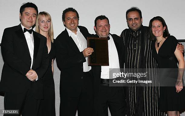 Members of staff from Jack Morton Worldwide receive the silver award for Best Animation. Graphics and Special Effects at the IVCA Awards 2007, held...