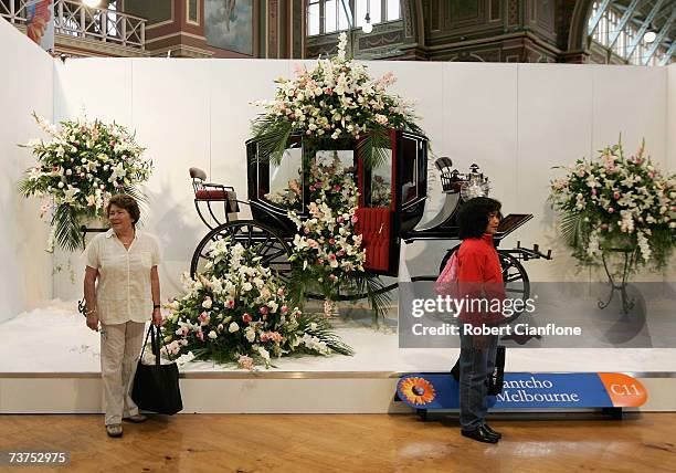 Visitors to the Flower and Garden Show admire the displays during the Melbourne International Flower and Garden Show at the Royal Exhibition Buidling...