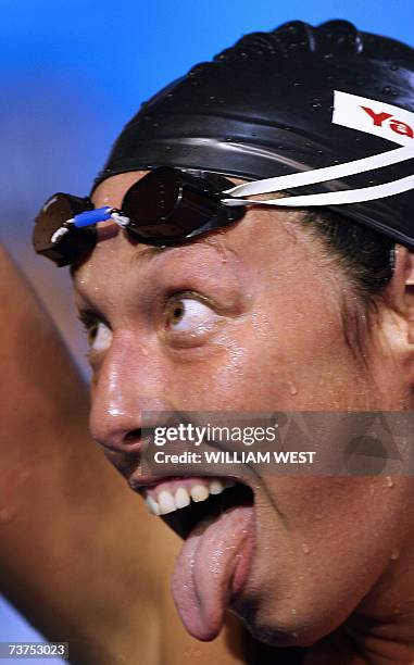 Flavia Rigamonti of Switzerland reacts after victory in the women's 1500m freestyle final 27 March 2007 in Melbourne at the 12th FINA World Swimming...