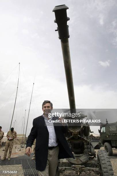 United Kingdom: Britain's Chancellor of the Exchequer Gordon Brown walks during a visit to the British army soldiers at the Camp Bastion in Helmand...