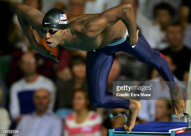 Cullen Jones of the United States of America dives off the blocks to start the Men's 50m Freestyle Final during the XII FINA World Championships at...