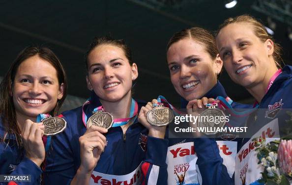 US swimmers Tara Kirk Lacey Nymeyer , Natalie Coughlin and Rachel