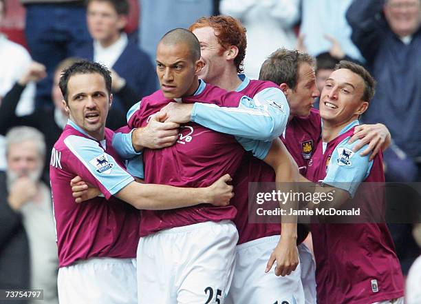 Bobby Zamora of West Ham is congratulated by teammates, Matthew Etherington and James Collins , after scoring the opening goal during the Barclays...