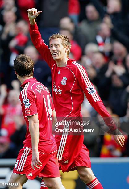 Peter Crouch of Liverpool celebrates scoring his team's fourth goal to complete his hat-trick during the Barclays Premiership match between Liverpool...