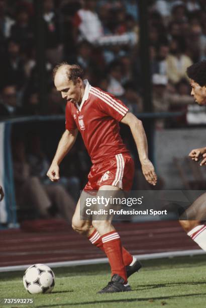 Polish professional footballer and midfielder with the Poland national football team, Grzegorz Lato pictured in action with the ball during the 1982...