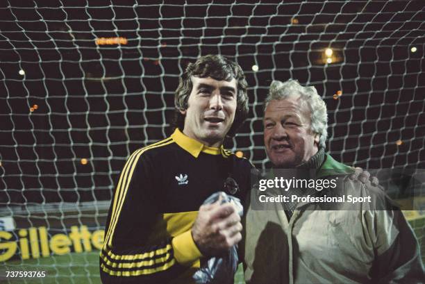 Irish professional footballer and goalkeeper with Arsenal, Pat Jennings pictured together with manager of the Northern Ireland national football team...