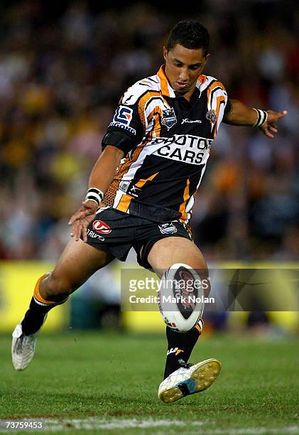 Benji Marshall of the Tigers attempts a field goal during the round three NRL match between the Parramatta Eels and the Wests Tigers at Parramatta...