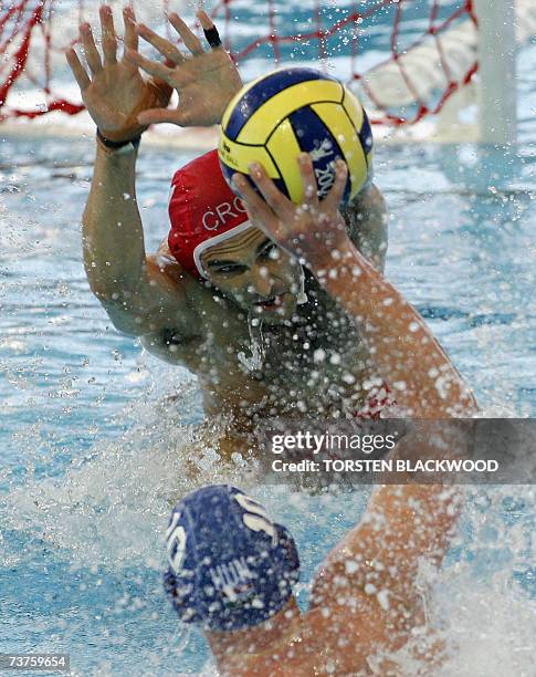 Goalkeeper Frano Vican of Croatia vies with Peter Biros of Hungary 01 April 2007 during the Croatia vs Hungary final match of the 12th Fina World...