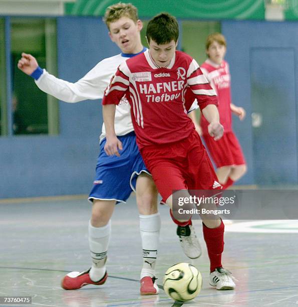 Teammembers of TSV Rosenheim and FK Pirmasens fight during the Futsal Cup at the Sportschool Kaiserau on April 01, 2007 in Bergkamen, Germany.