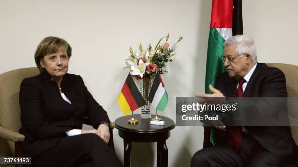 German Chancellor Angela Merkel attends a meeting with Palestinian President Mahmoud Abbas at his headquarters April 1, 2007 in Ramallah, West Bank....