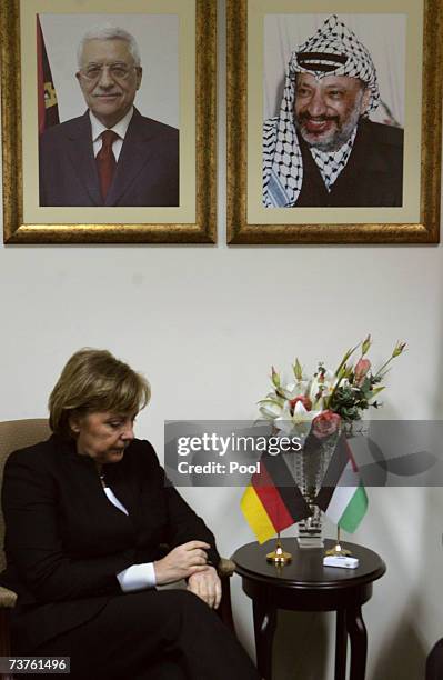 German Chancellor Angela Merkel attends a meeting with Palestinian President Mahmoud Abbas at his headquarters April 1, 2007 in Ramallah, West Bank....