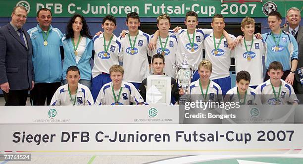 The members of SC Karlsruhe pose after winning the Futsal Cup at the Sportschool Kaiserau on April 01, 2007 in Bergkamen, Germany. Far left stands...