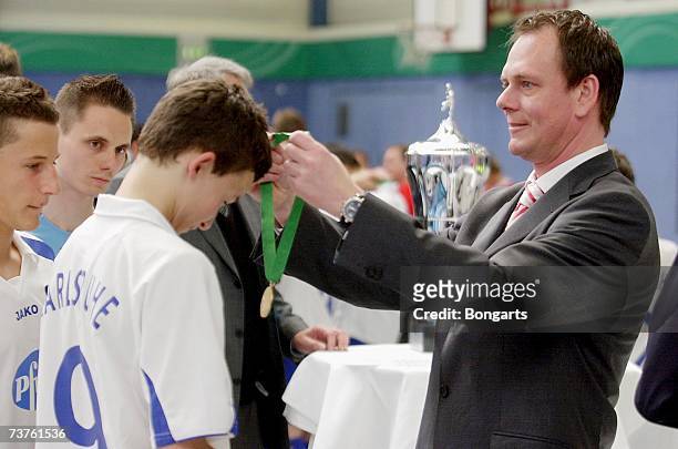 Official Bernd Barutta honors the members of SC Karlsruhe after victory in the Futsal Cup at the Sportschool Kaiserau on April 01, 2007 in Bergkamen,...