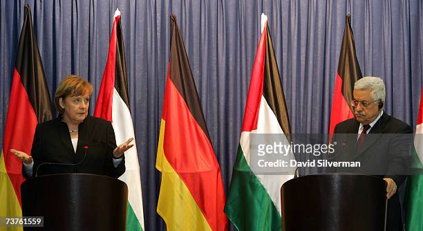 German Chancellor Angela Merkel gestures during her joint press conference with Palestinian President Mahmoud Abbas after their meeting in his...