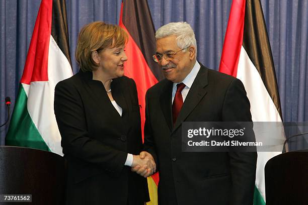 German Chancellor Angela Merkel and Palestinian President Mahmoud Abbas shake hands after their joint press conference after their meeting April 1,...