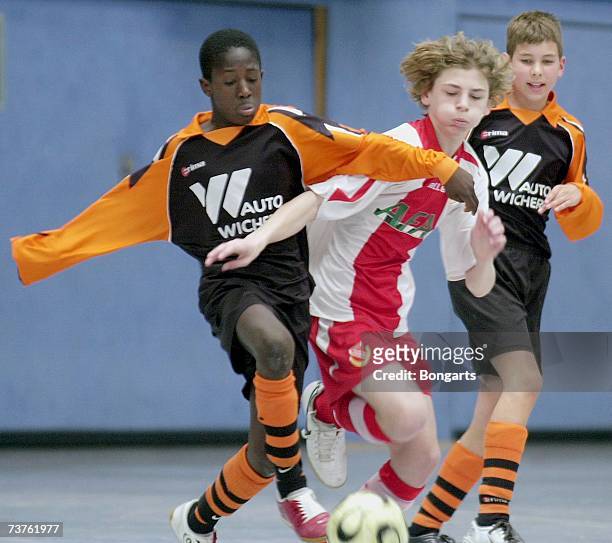 Felix Gorgas of SG Alstertal Langhorst plays the ball against Claudio Fidomski of Energie Cottbus during the Futsal Cup at the Sportschool Kaiserau...