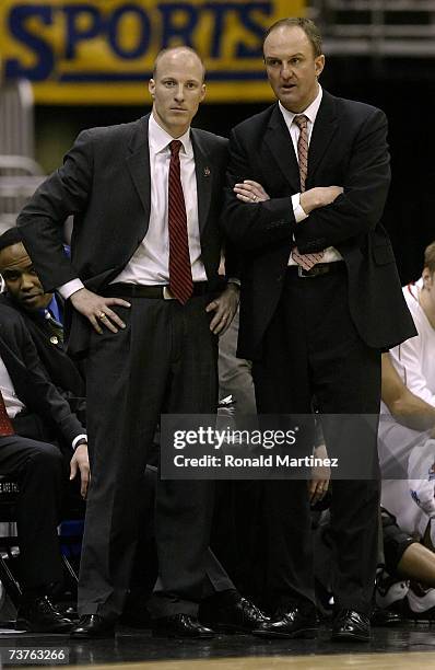 Head coach Thad Matt and assistant coach John Groce of the Ohio State Buckeyes talk on the sideline against the Memphis Tigers during the south...