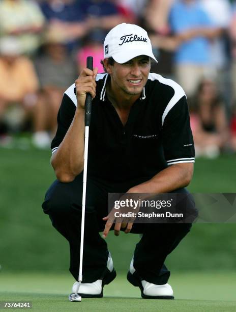 Adam Scott of Australia lines up his final, winning putt on the 18th hole during the final round of the Shell Houston Open on April 1, 2007 at the...