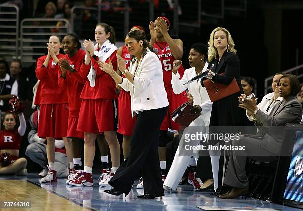 Head coach Vivian Stringer of the Rutgers Scarlet Knights applauds her teams play against the LSU Lady Tigers during the National Semifinal game of...