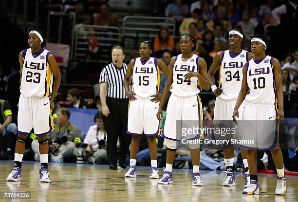 Allison Hightower, Quianna Chaney, Ashley Thomas, Sylvia Fowles and Khalilah Mitchell of the LSU Lady Tigers wait for play to start back up against...