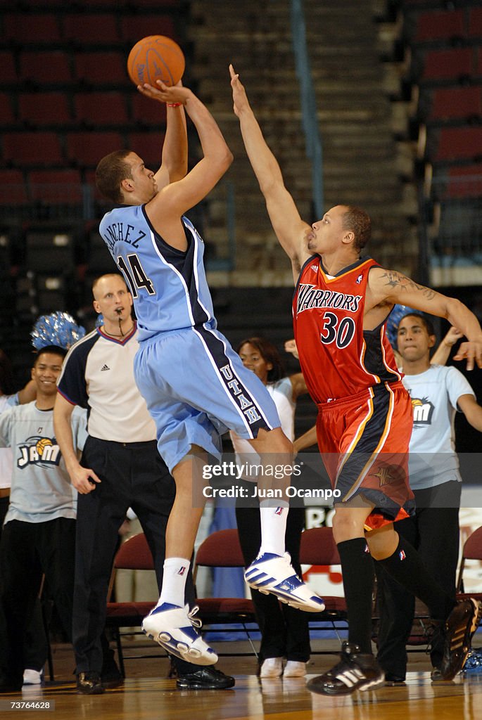 Roderick Riley Nba Ricky Sanchez of the Idaho Stampede shoots over Roderick Riley of the ...
