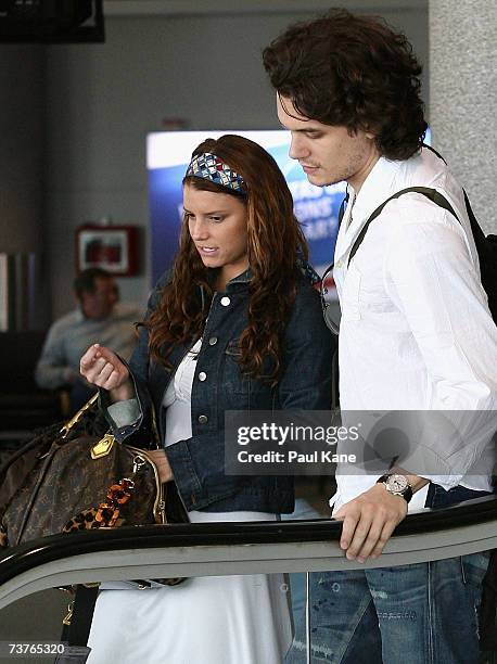 Singer Jessica Simpson and musician John Mayer are seen leaving Perth Airport on April 2, 2007 in Perth, Australia.