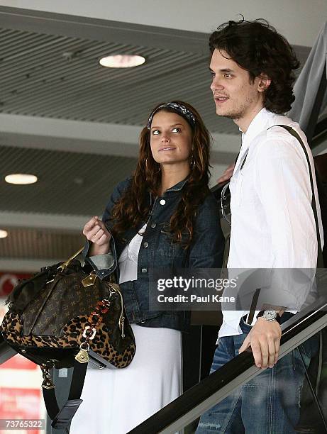 Singer Jessica Simpson and musician John Mayer are seen leaving Perth Airport on April 2, 2007 in Perth, Australia.