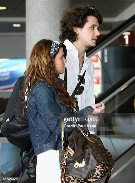 Singer Jessica Simpson and musician John Mayer are seen leaving Perth Airport on April 2, 2007 in Perth, Australia.