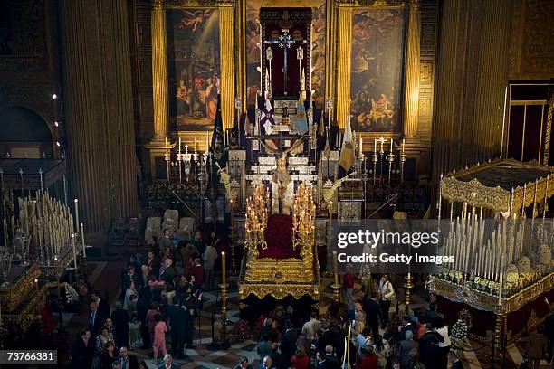 The carriages of 'La Borriquita' and 'El Amor' brotherhood are seen in The Church of La Anunciacion prior the departure of 'La Borriquita' procession...