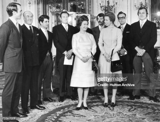 Princess Anne, Captain Mark Phillips and Queen Elizabeth with a group of guests including Inspector James Beaton, journalist Brian McConnell and...