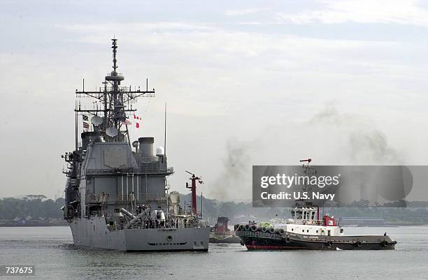 The guided missile cruiser, USS Cowpens arrives in Singapore February 2, 2001 to load supplies for India's earthquake victims. The U.S. Navy's...