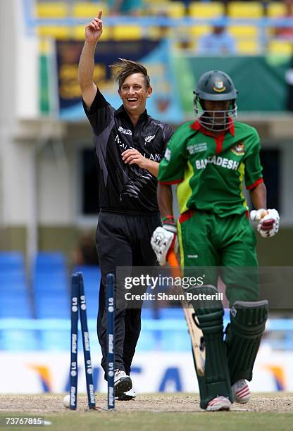 Shane Bond of New Zealand celebrates after bowling Saqibul Hasan of Bangladesh during the ICC Cricket World Cup 2007 Super Eight match between New...