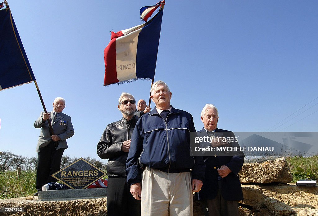 Three American veterans, Jim Gabaree (L,...