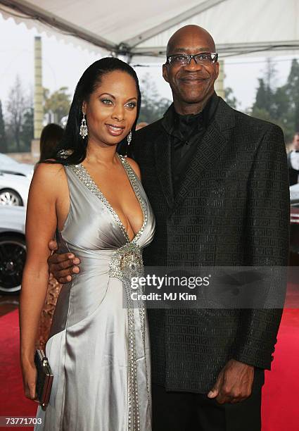 Laureus World Sports Academy member Edwin Moses and Michelle Douglas attend the awards ceremony during the Laureus Sports Awards at the Palau Sant...