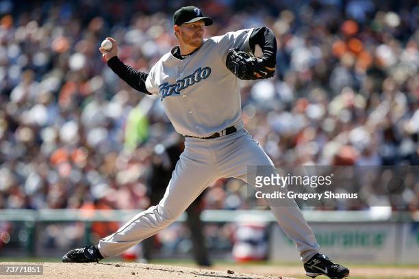 Starting pitcher Roy Halladay of the Toronto Blue Jays throws a pitch against the Detroit Tigers during the Home Opener for the Detroit Tigers at...