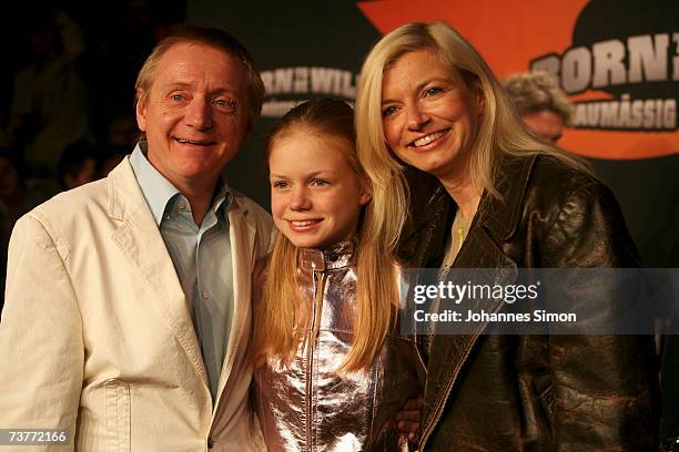 German actors Michaela Merten , husband Pierre Franckh and common daughter Julia attend the German film premiere of "Born to be wild - saumaessig...