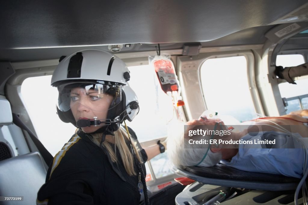 Doctor and patient in medical helicopter