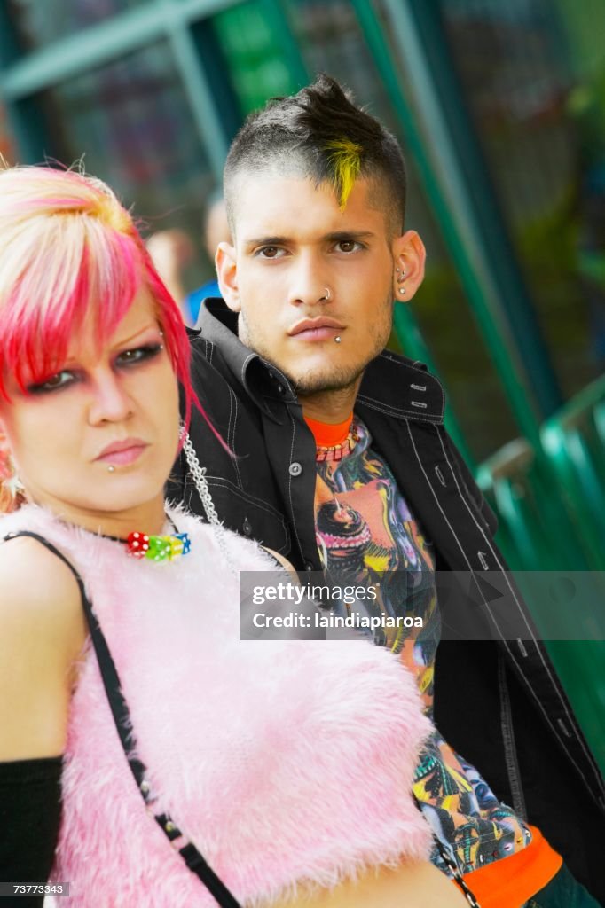 Close up of Hispanic punk couple outdoors