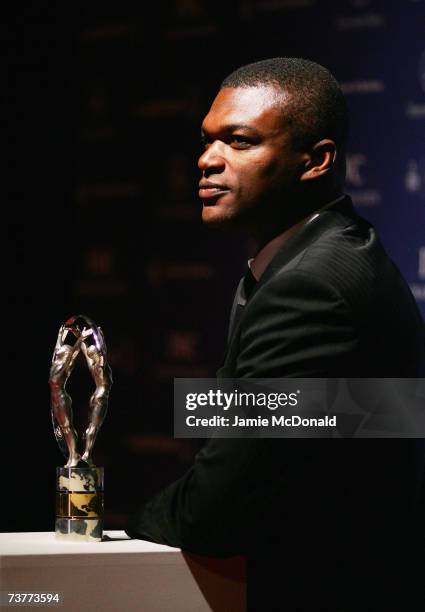 Laureus World Sports Academy member Marcel Desailly poses with an award as he attends the Laureus Sports Awards at the Palau Sant Jordi on April 2,...