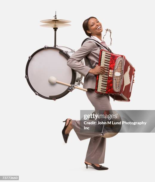 african one woman band - accordion instrument stock pictures, royalty-free photos & images