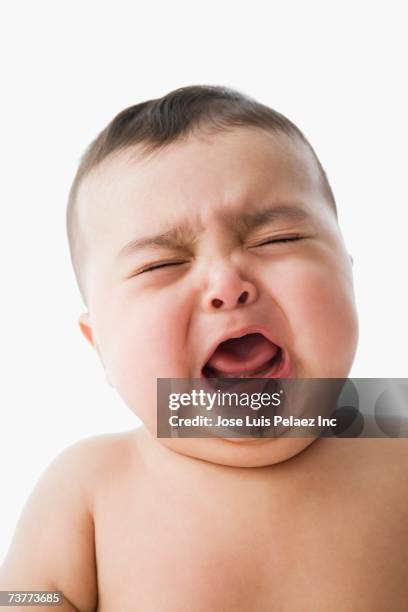 studio shot of baby crying - baby crying photos et images de collection