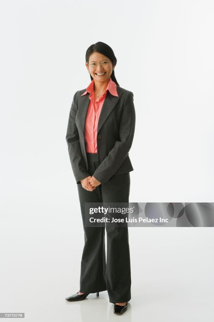 Studio shot of Asian businesswoman