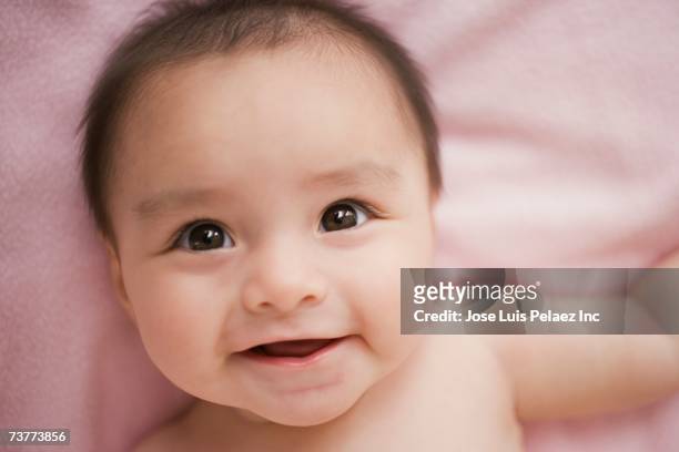 close up of baby smiling - mexican and white baby stock pictures, royalty-free photos & images