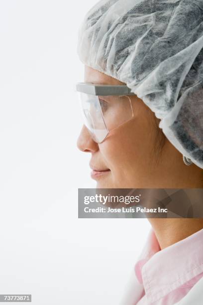 profile of asian female doctor - scientist profile stock pictures, royalty-free photos & images